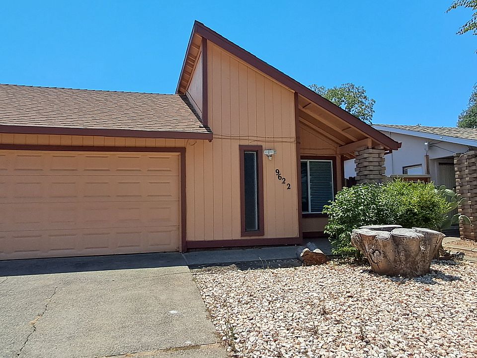 Entrance door/two car garage and drive way.