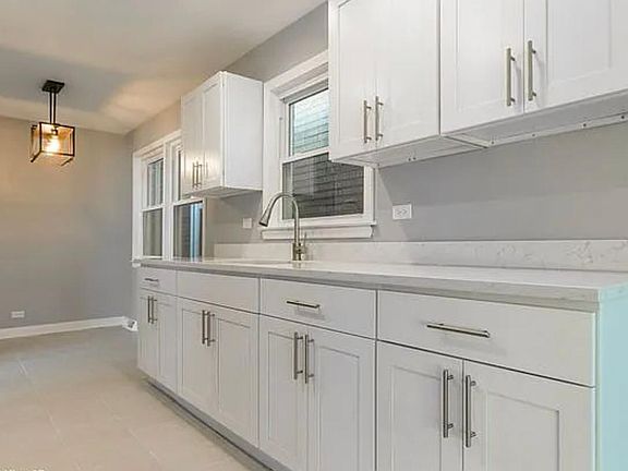 5th image of 10809 S Ave N #2