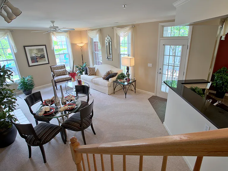 Townhome living and dining area (staged)