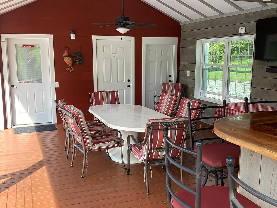 Left hand door entry to house, from deck Bar area. Middle door entry for 1/2 bath.