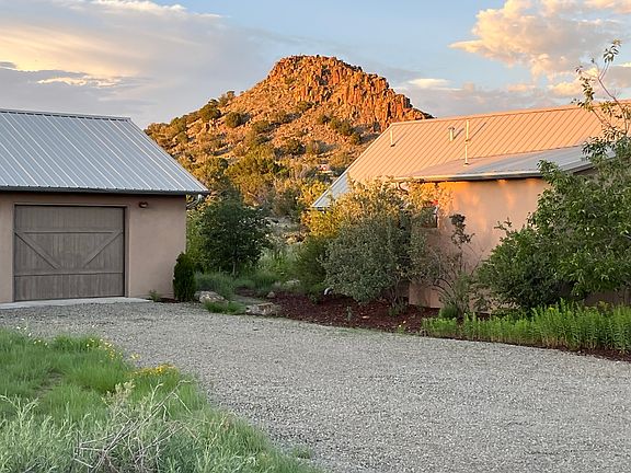Famous Lone Butte between bunkhouse and main house
