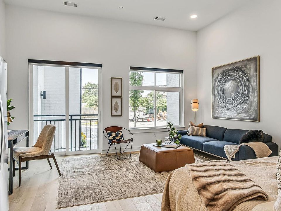 Gorgeous room with plenty of light, can fit a king bed, pull out sofa couch, desk, huge TV, coffee table and plenty of room to move around and entertain