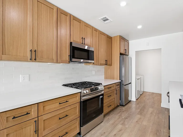 16257 Los Alimos St — Photo 3