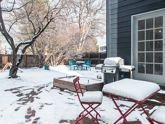 Backyard with patio, lawn, shed, and direct access to private park