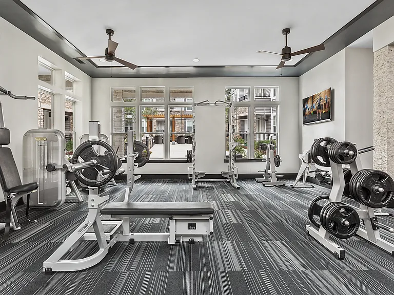 Fully-Equipped Fitness Center with Highly-Specialized Technogym Cardio Machines, Free Weights, Spin Bikes, and Individual Strength Training Machines