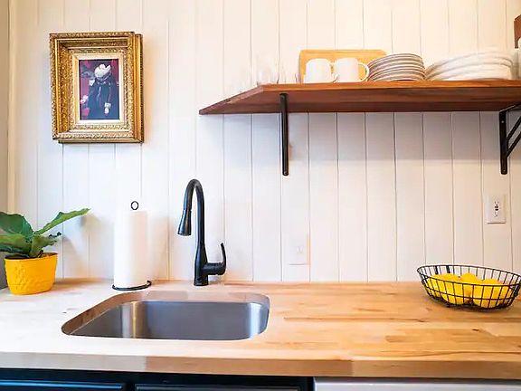 Vertical shiplap and custom-built shelving!