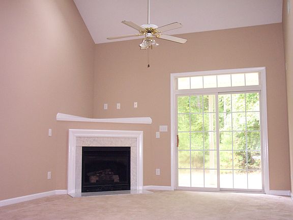 Family room, fireplace, vaulted ceiling