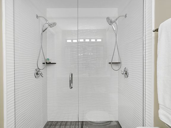 Second floor bath with double shower.