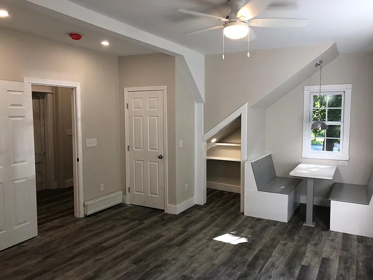 Ground floor bedroom with table/desk nook.