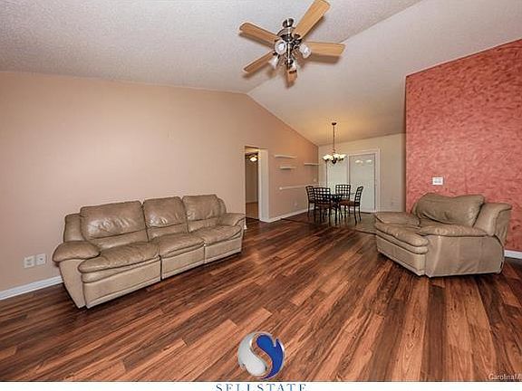 Cathedral ceiling in living room, split bedroom floor plan makes this home ideal.