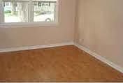 Bedrooms W/ Laminate Floors & Fresh Neutral Paint