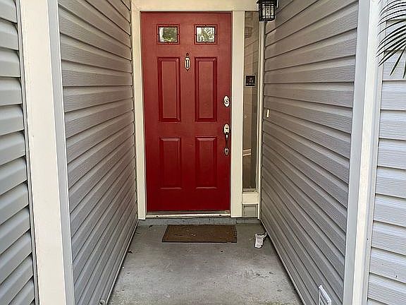 Front door. New vinyl lap si