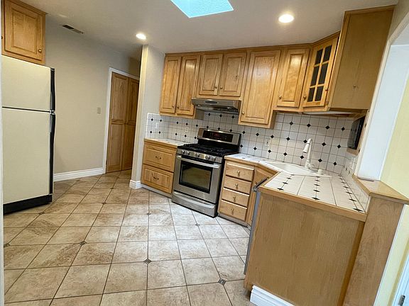 bright kitchen with skylight. all appliance included