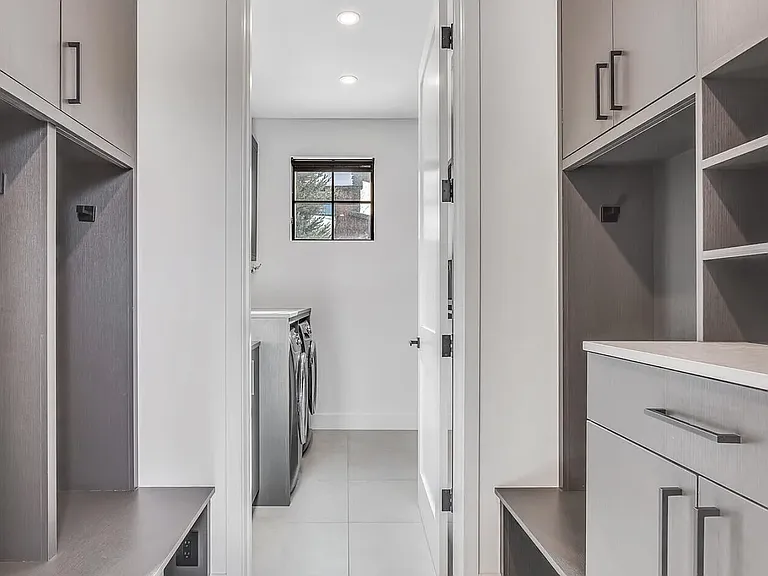Storage by Laundry Room