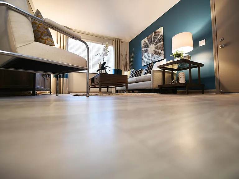 Spacious living room with hardwood-style flooring