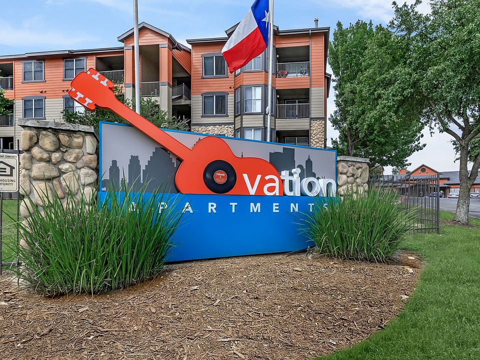 Signature Guitar Monument Sign at Ovation Apartments in Austin, TX
