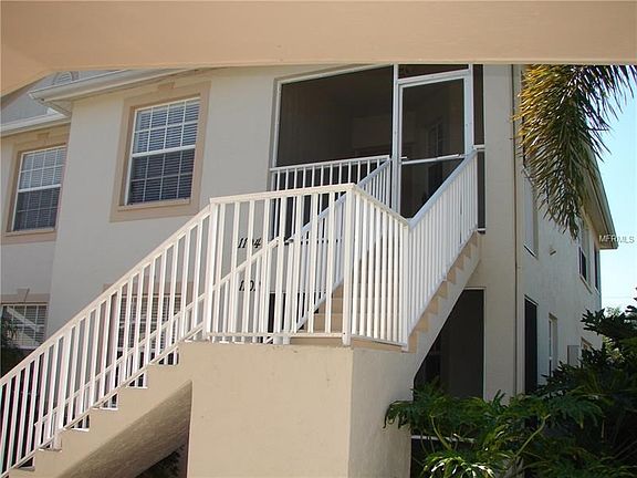 Screened porch entry allows you to enjoy the Sea Breeze.