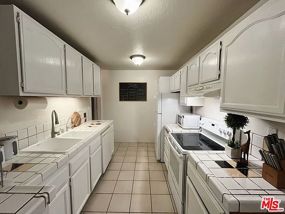 4th image of 5950 Canterbury Dr APT C211