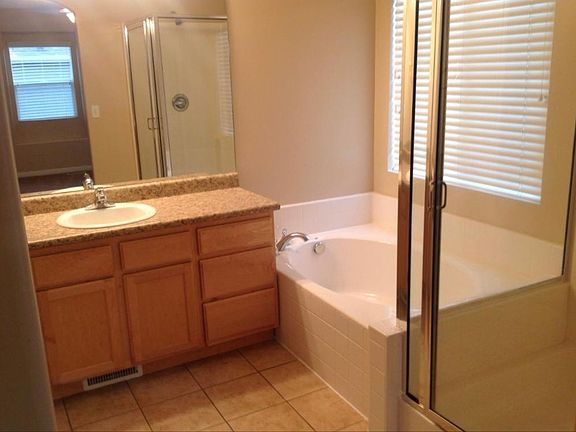 Master Bathroom with Tub and Shower