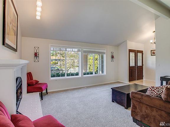 Here's a view of the living room from the perspective of the formal dining room. All of the home's windows have been upgraded to vinyl double-panes.