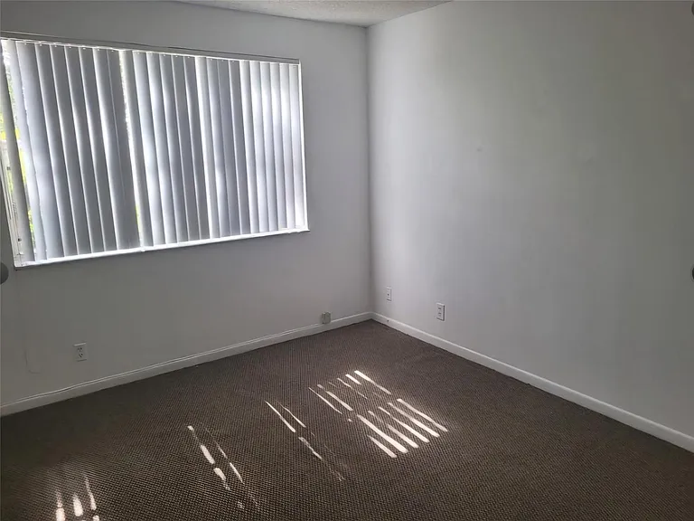 8741 Wiles Rd #305 — Photo 7