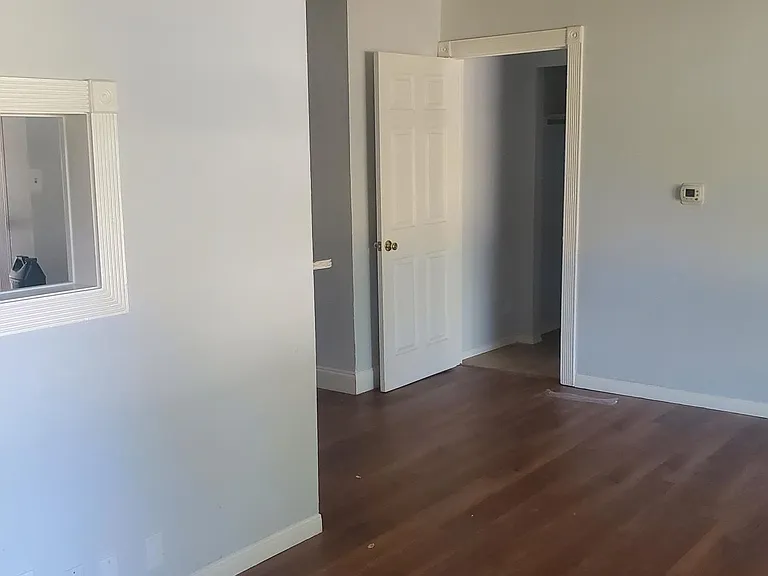 from living room to door leading to another bedroom with it's own bathroom we call MIL