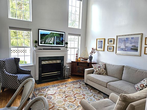 TWO-STORY FAMILY ROOM WITH GAS FIREPLACE