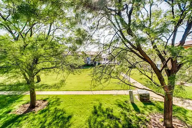 Building Photo - 8836 N Western Ave #204D