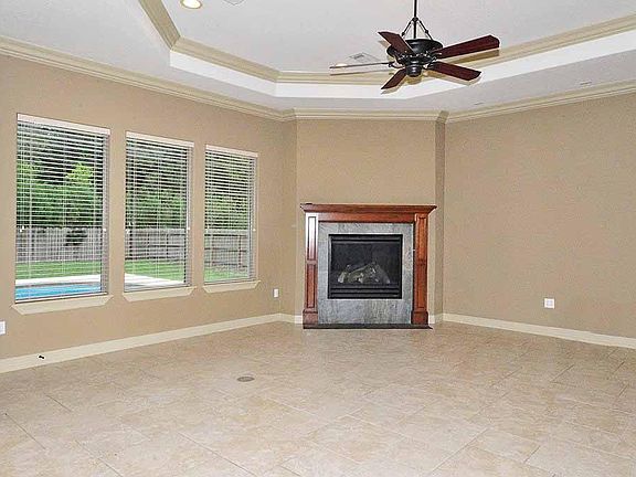 Living room with pool views.