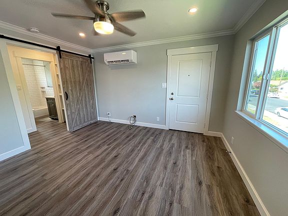LVP (luxury vinyl plank) flooring throughout! Barn door separates Living and Bed/Bath area.