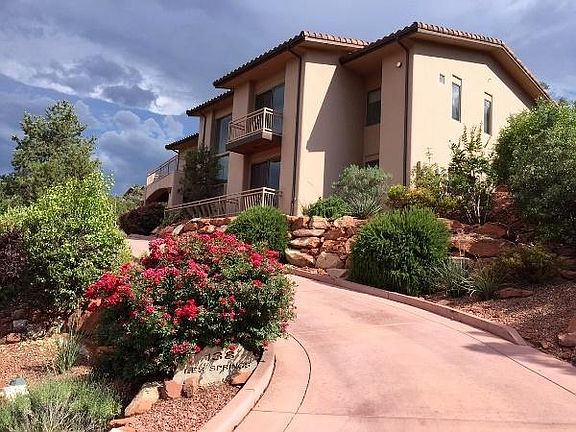 Your hilltop oasis backs to forest with no nearby neighbors for perfect privacy