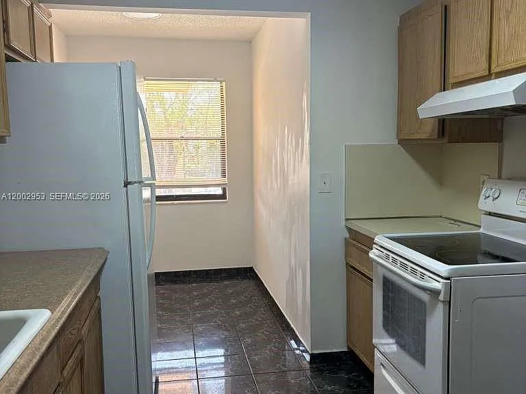 5937 Forest Hill Blvd #204 — Photo 9