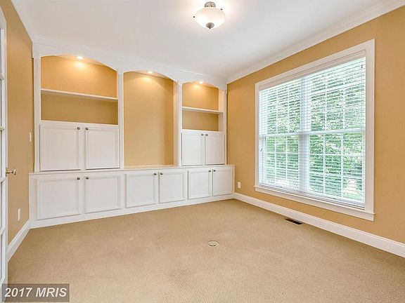 Office on Main Level w/ Built-in Bookcases &