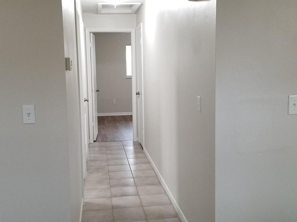 hall looking down from entrance to bedrooms