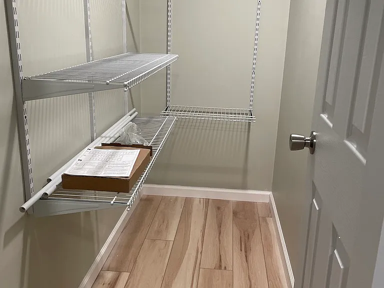 walk in closet in basement suite