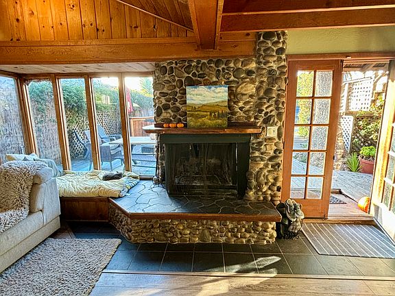 Front entry and stone fireplace