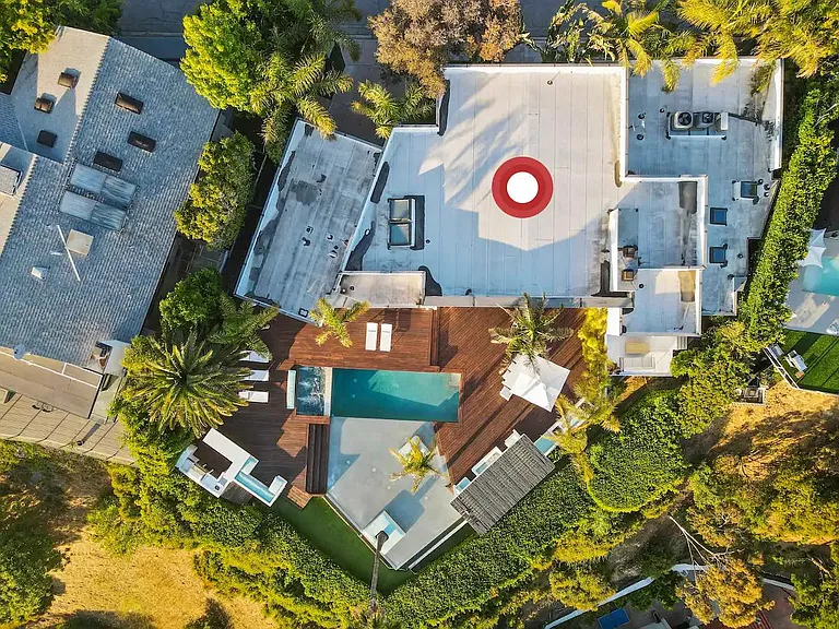 Marvel at the grandeur of the home from an elevated perspective, showcasing its elegance and charm.