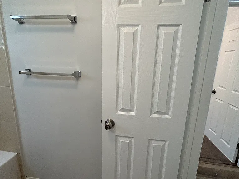 Double towel racks, bathroom door