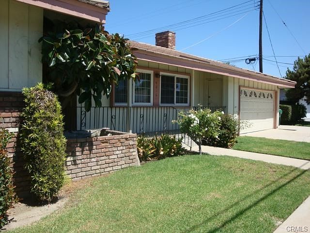 Front of house from the west side.