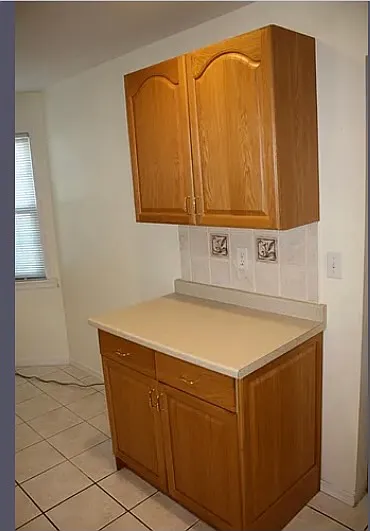 Work Station opposite dish washer.