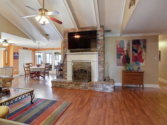 Den w/wood burning fireplace