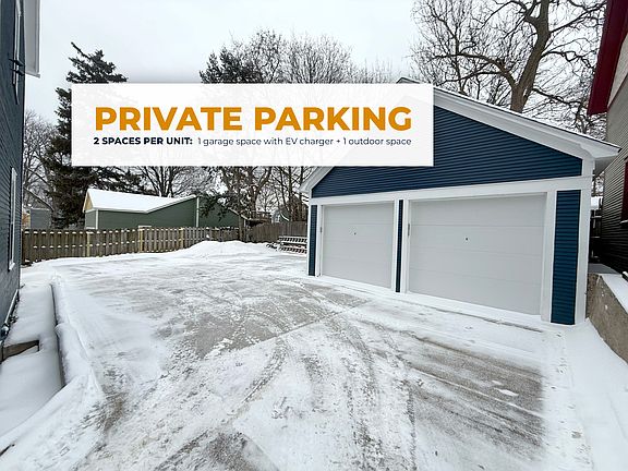 Designated parking: garage, outdoor parking spaces, and turnaround area