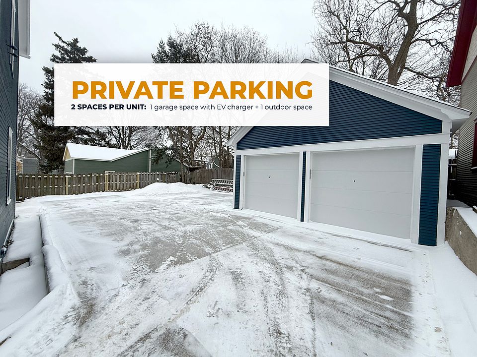 Designated parking: garage, outdoor parking spaces, and turnaround area