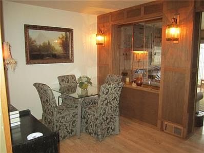 Dining Room with Custom Leaded Stained Glass Sconces and hanging panels.