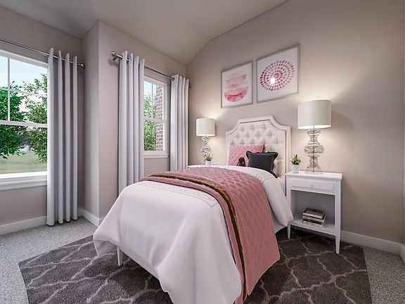 A cozy and well-decorated bedroom with a plush bed, nightstands, and decorative accents, set against