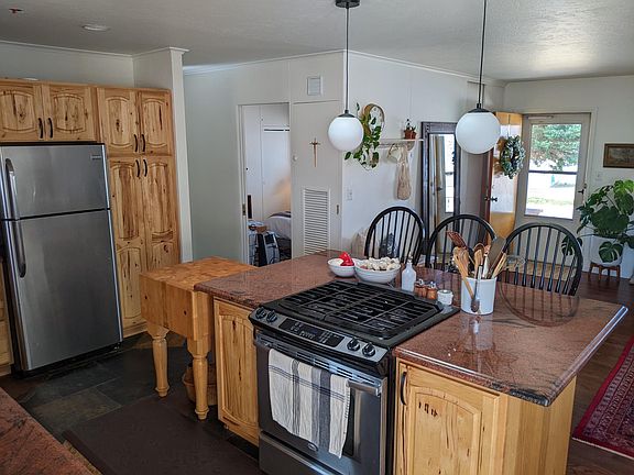 View from kitchen towards front door