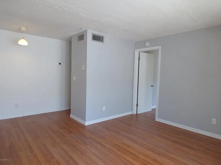Living/dining leading to bedroom