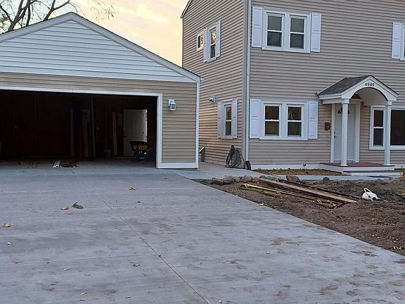 New Garage (door is being installed soon). Ample driveway area.