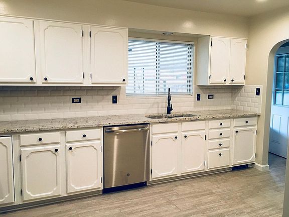 Slab granite; tons of storage!