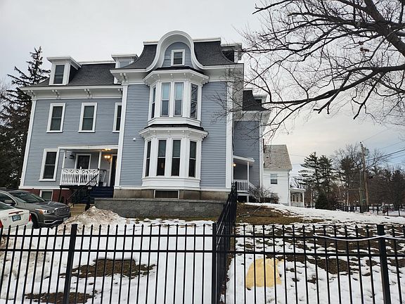 Beautiful renovated Victorian home with 2 apartments on each floor and a fenced yard